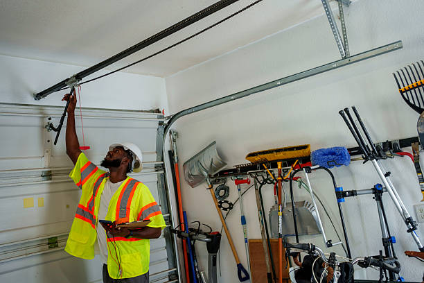 Professional Garage Door Panel Replacement technician working in Tenafly, NJ